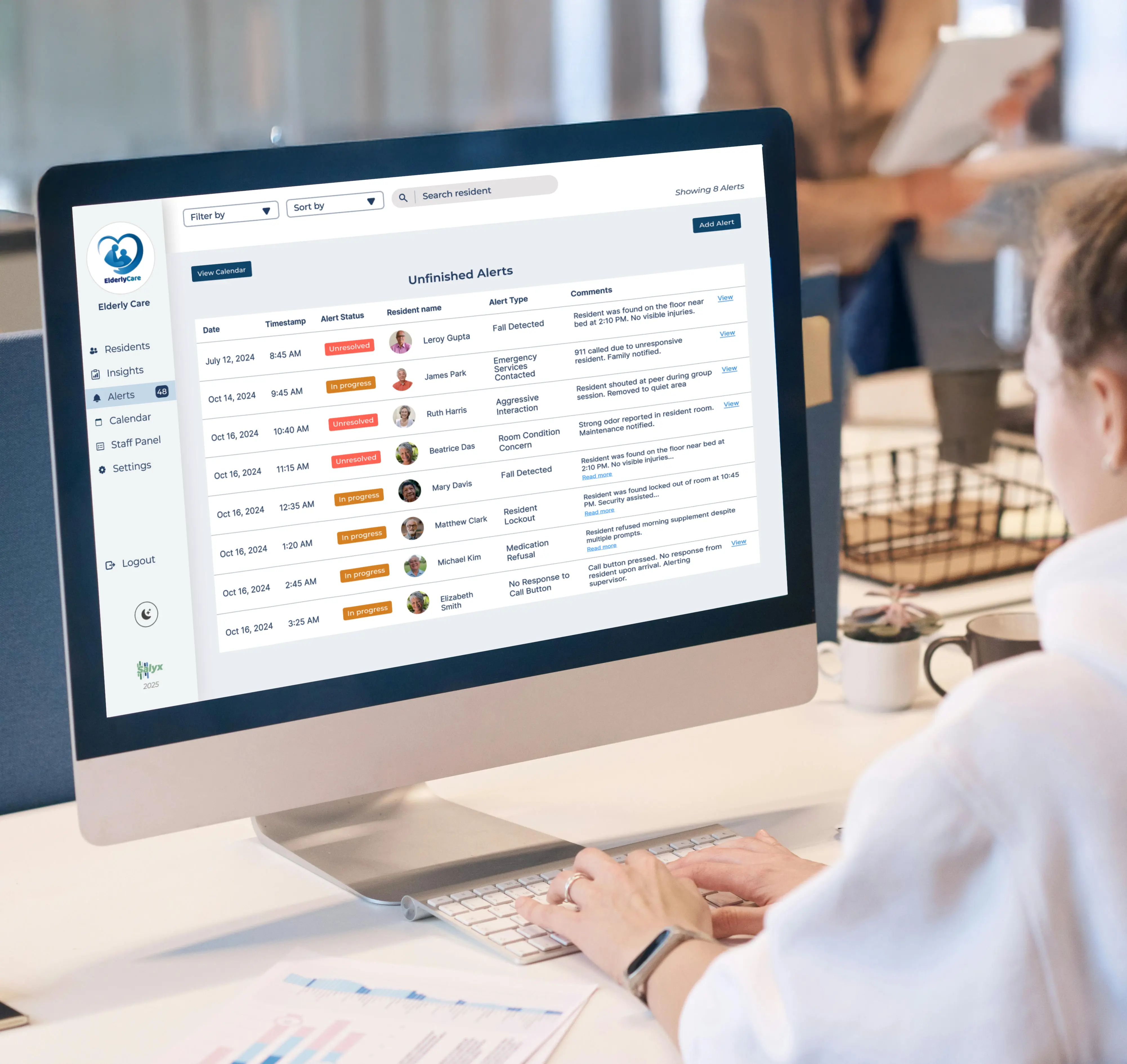 Retirement home staff using the alert page of our salyx dashboard.